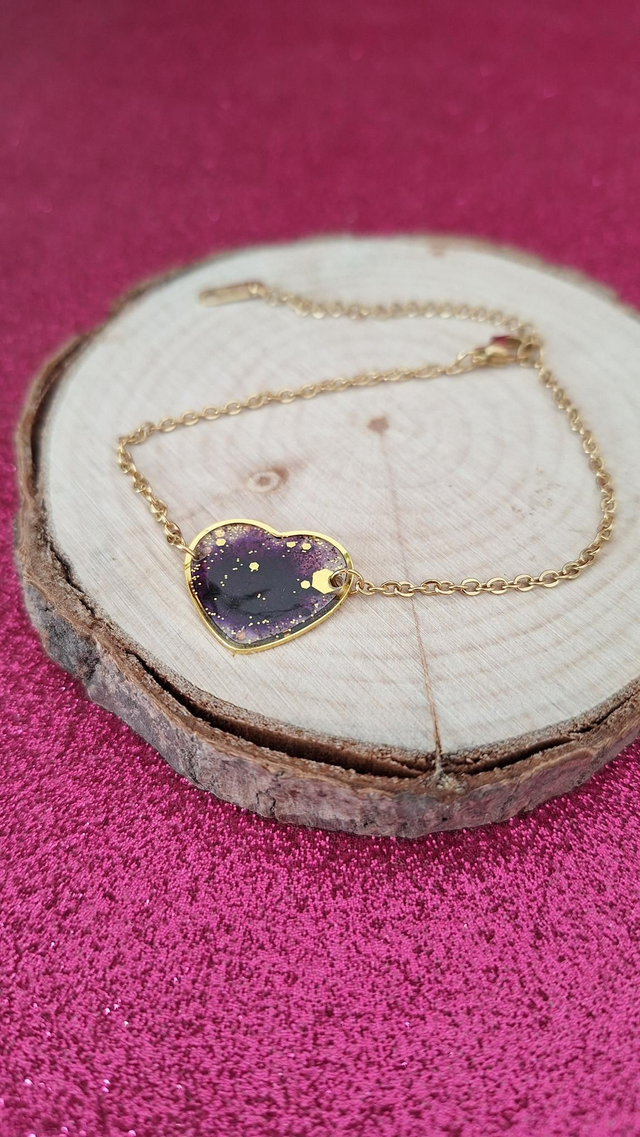 Bracelet doré cœur violet et paillettes dorées 
