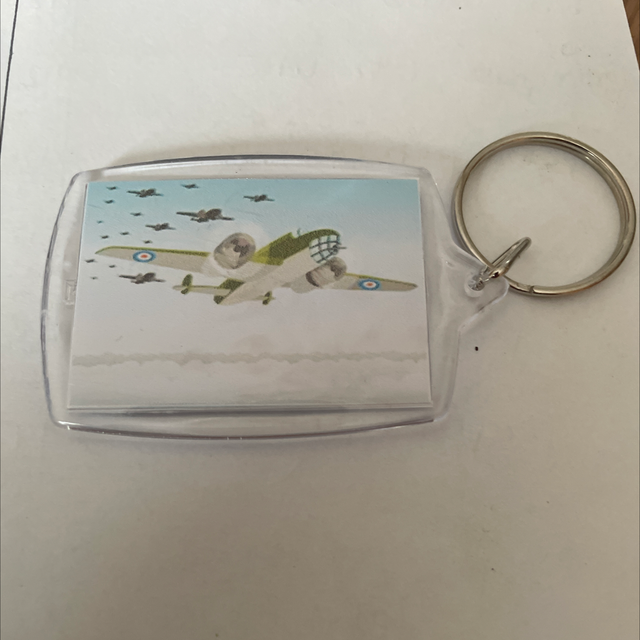 Porte clé plastique avions clair