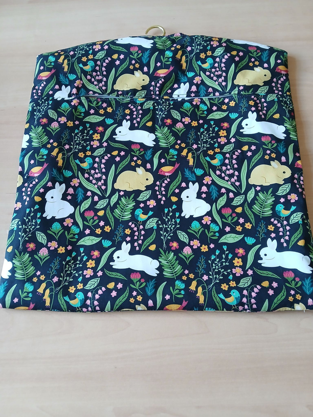 Handmade Peg Bag/Storage Bag with Wooden Coat Hanger in Cotton Bunnies Print Fabric with Plain lining. 