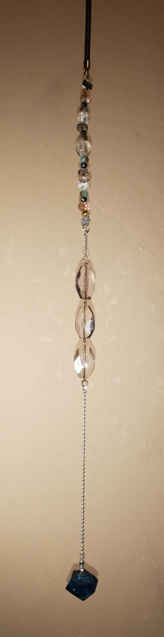 Attrape-soleil pendule 