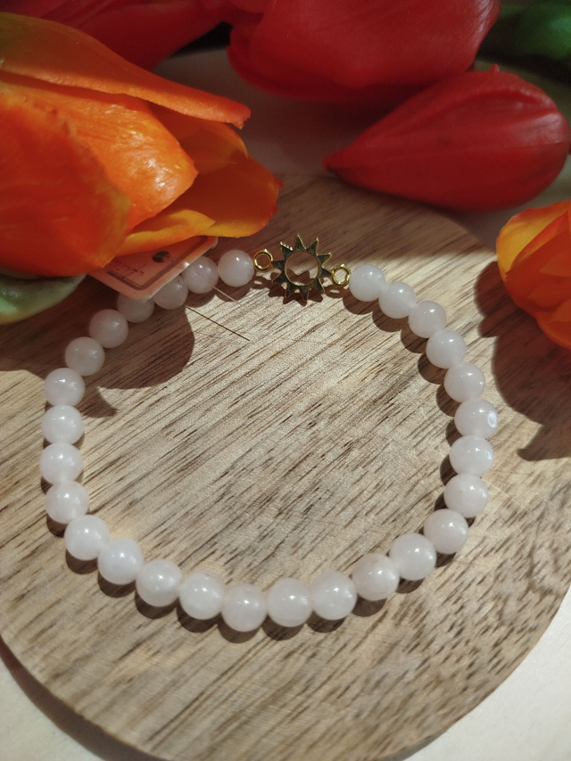 Bracelet quartz rose , breloque soleil