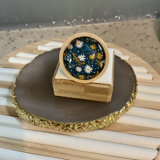 Handmade brooch with blue Christmas design. Beautiful Christmas gift.