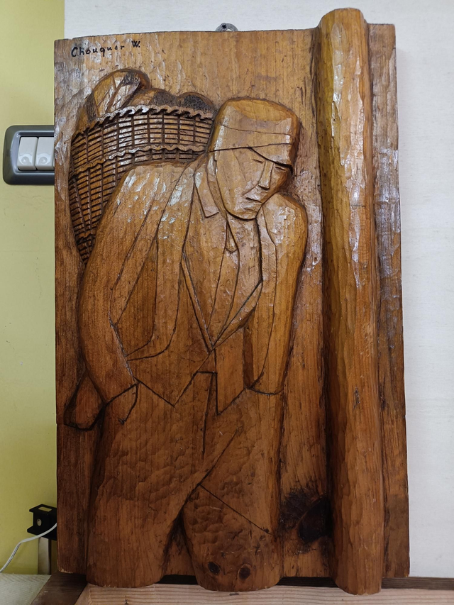 Uomo con gerla(Basso rilievo)