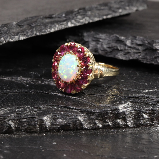Vintage 9K 9Ct 375 Solid Yellow Gold Oval Firey Rainbow Flash Cabochon Opal Red Ruby Claw Set Halo Design Ring Size N - 6 1/2