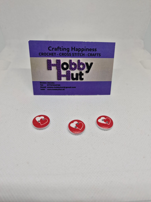 Red Buttons With One Red And One White Heart