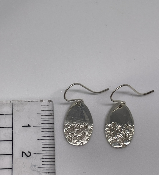 Oval 1/2 textured silver earrings