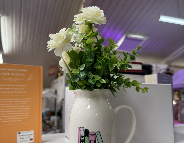 Bookaholic milk jug flower pot 