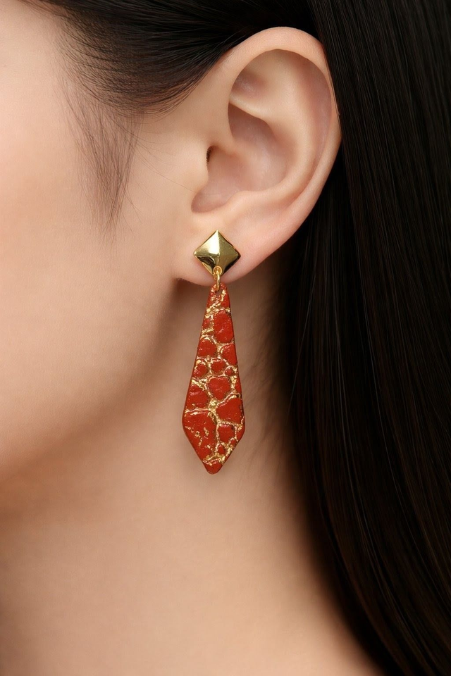 Boucles d'oreilles relief doré