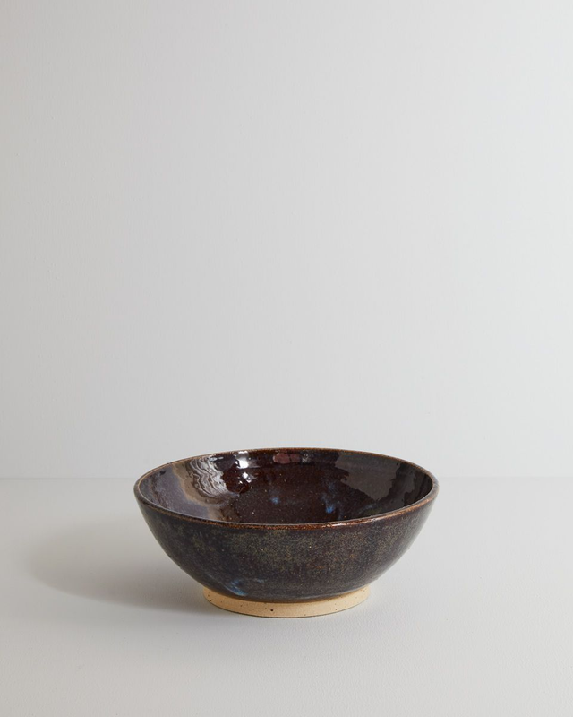 Bowl with foot in blue mist