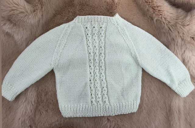Pale green crew neck jumper