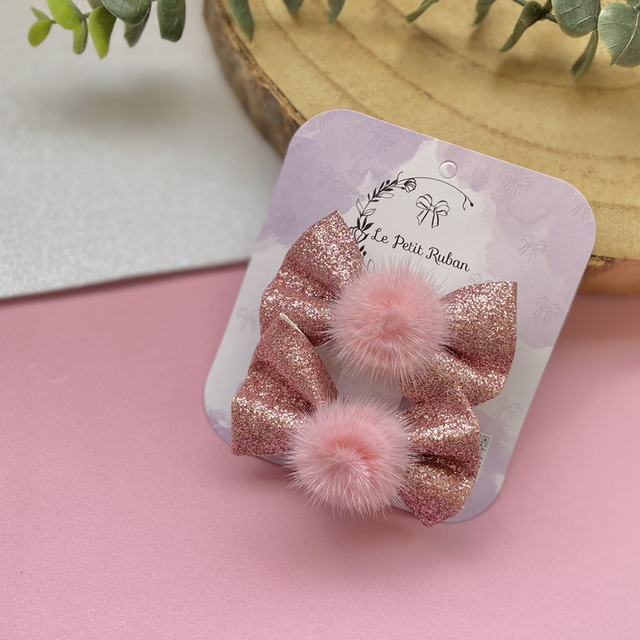 Paire de barrettes pompons 