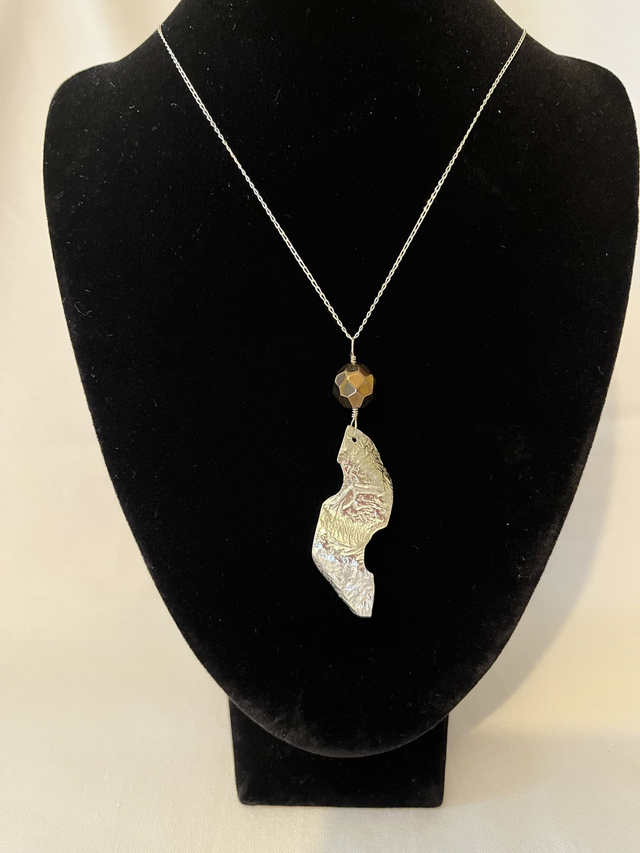 Reticulated Silver Pendant with Amber Glass Bead