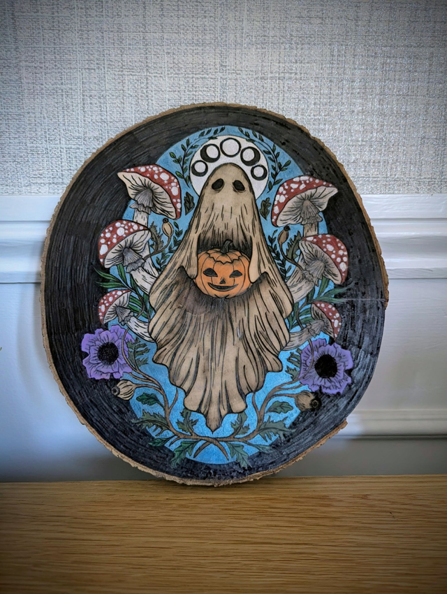 Ghostly hallows wooden art slice. 