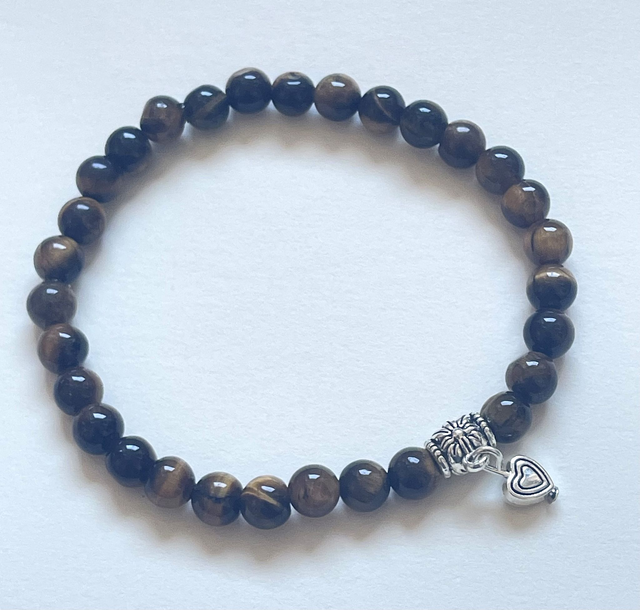 B47- Bracelet oeil de tigre et charms en métal