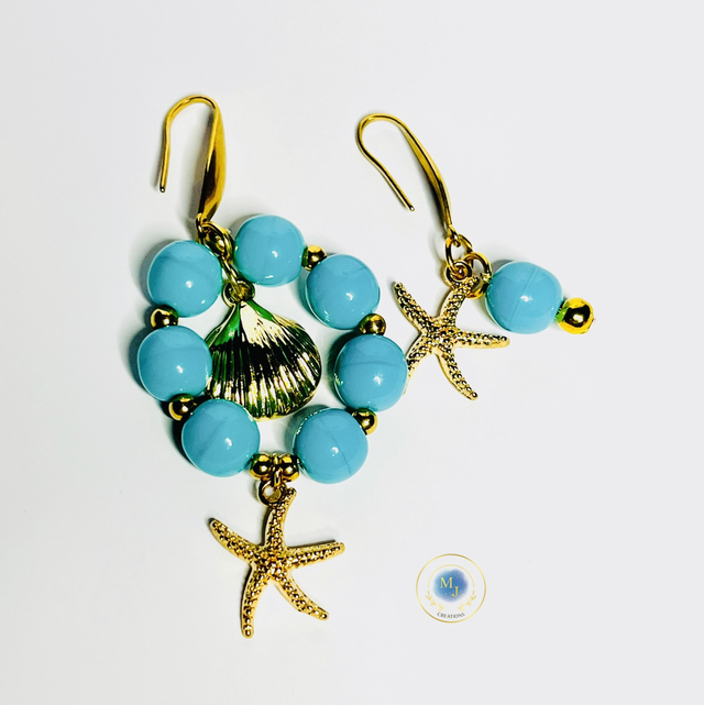 Handgemaakte Turquoise Oorbellen met Zeester &amp; Goudkleurige Details 