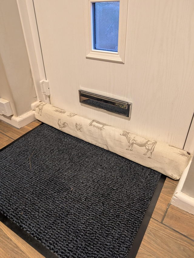 Farm animal draft excluder