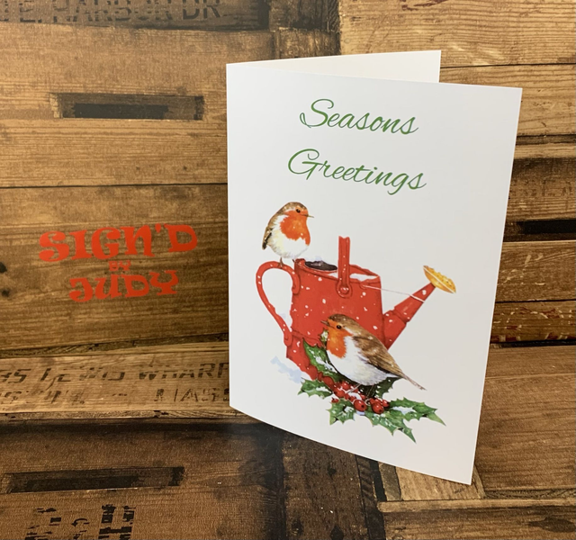 Seasons greetings card with robins