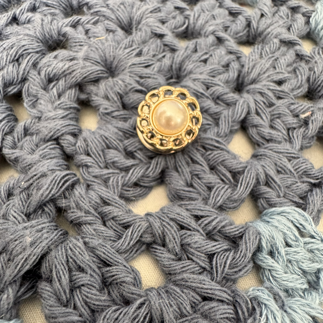 Pin’s perle soleil