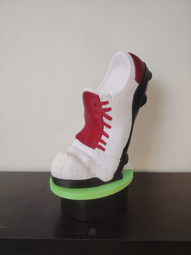 Football boots stand porta joystick