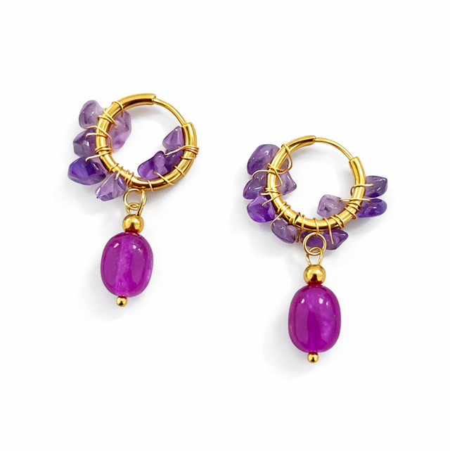 Argollas acero dorado piedras moradas 