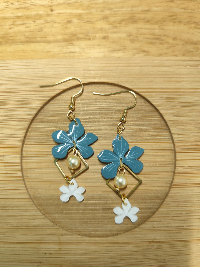 Cléor bleu paon et blanc