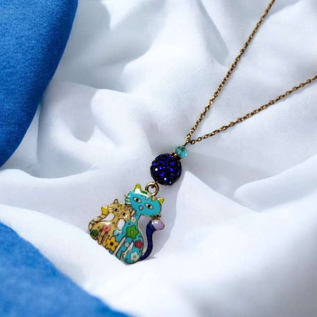 Collier acier inoxydable et cristal bleu et jaune chats