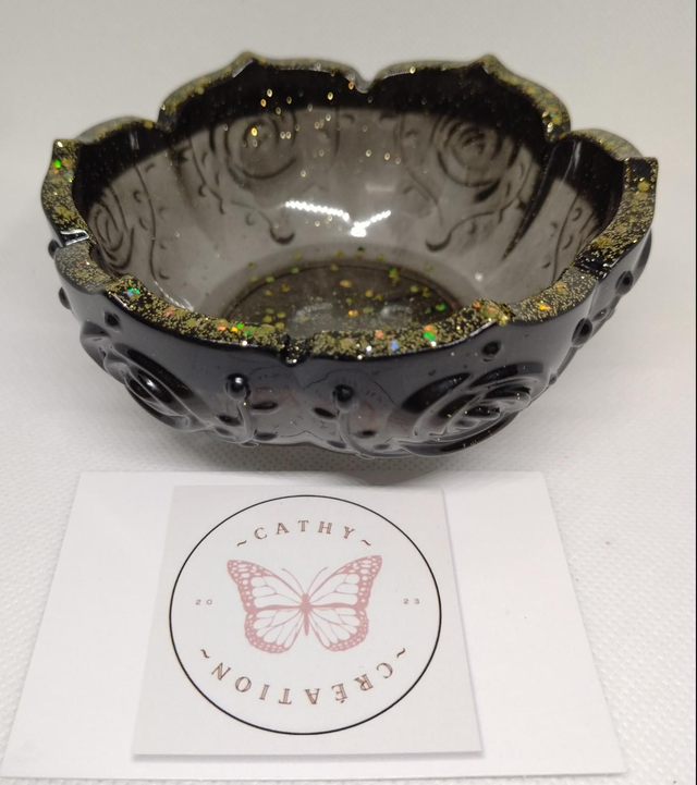 Vide poche noir avec paillettes dorées 