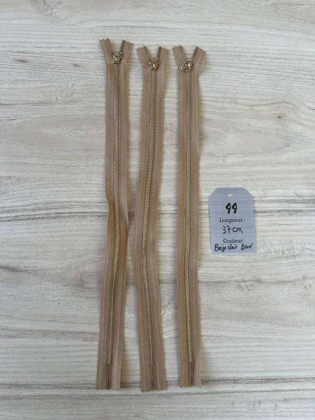 Fermetures éclair métallique beige doré 37cm