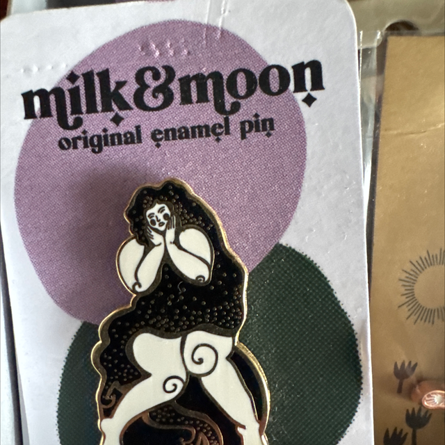 Milk and moon pin badges