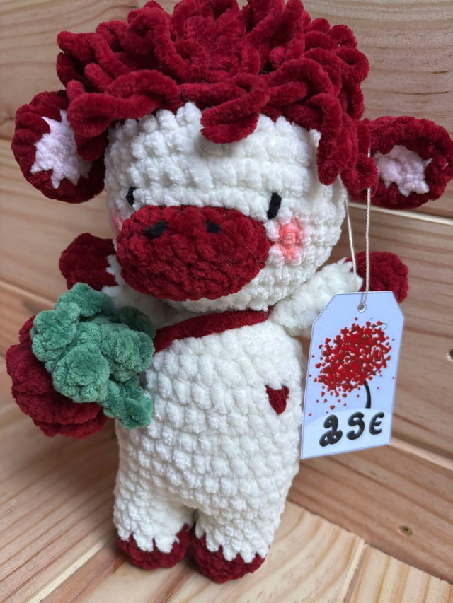 vache avec un petit sac 