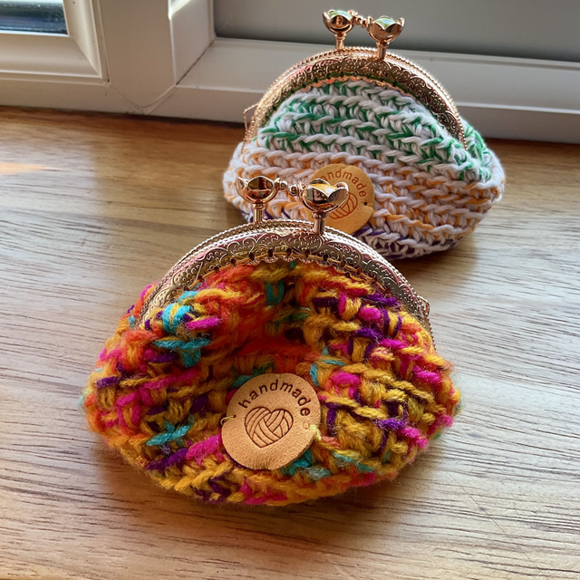 Handmade crochet coin purse. Rainbow design.