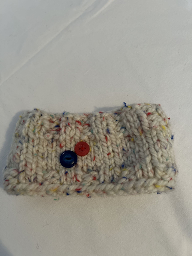 7028  child's knitted ear warmers