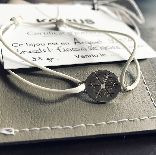 Bracelet Flocon de neige sur cordon blanc