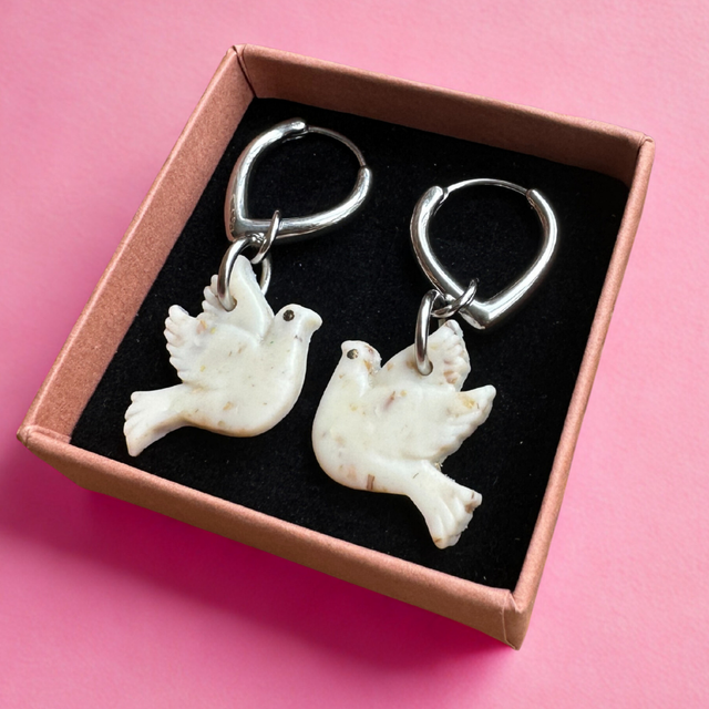 Colombes blanc moucheté