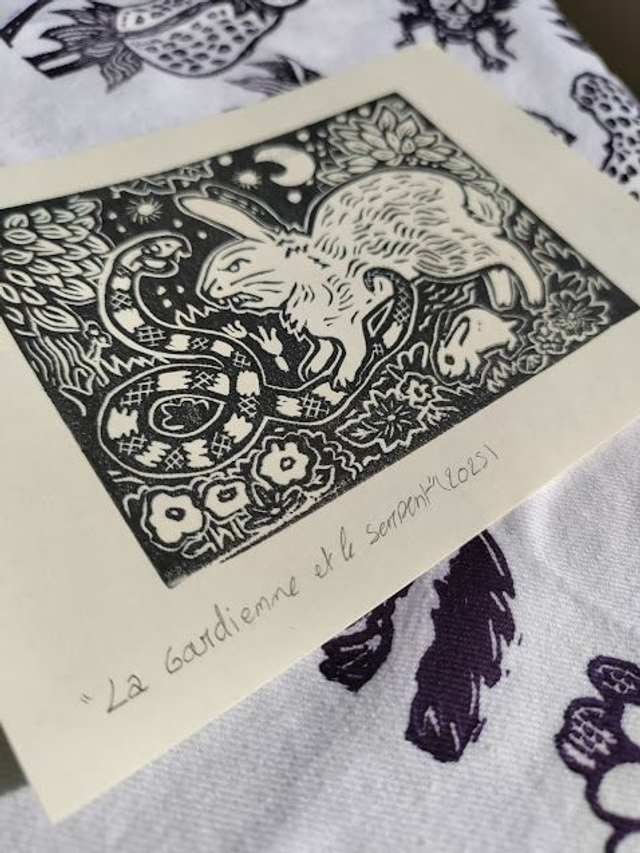 Linogravure/tampon " la gardienne et le serpent" lapins sauvage format 10X14.5 cm