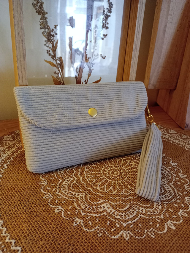 Pochette avec dragonne