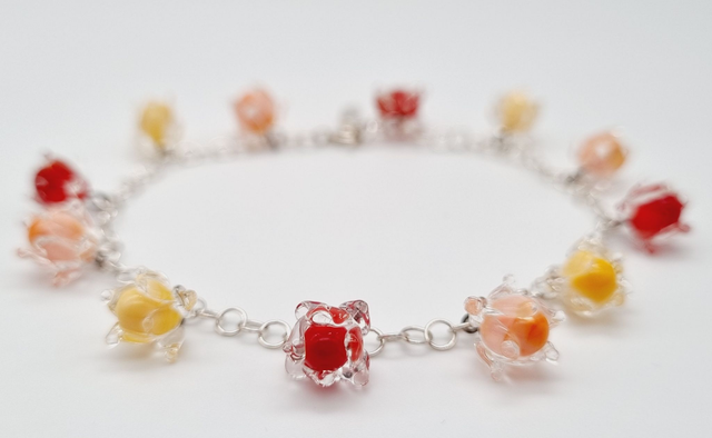 Bracelet Clochettes rouges, jaunes et oranges