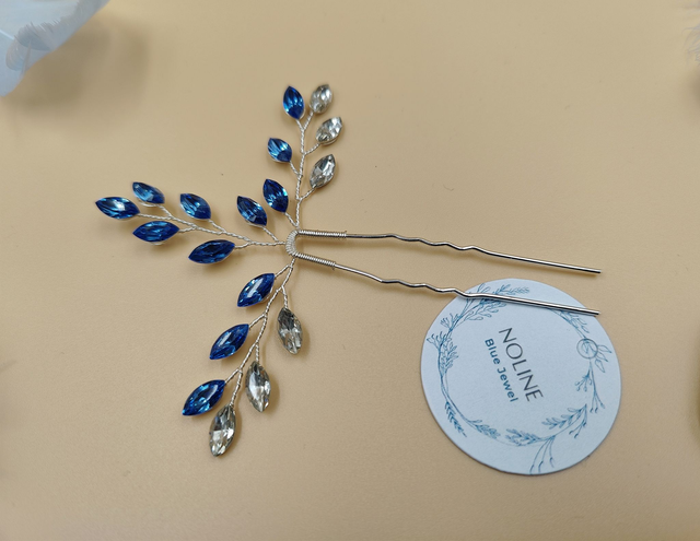 Épingles à cheveux argentées avec strass brillants