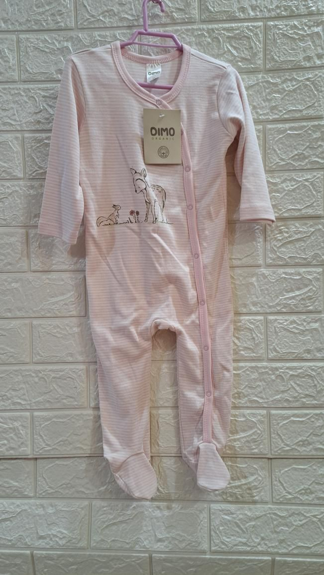 Tutina rosa a righe con bottoncini