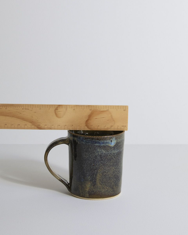 A single mug in blue mist