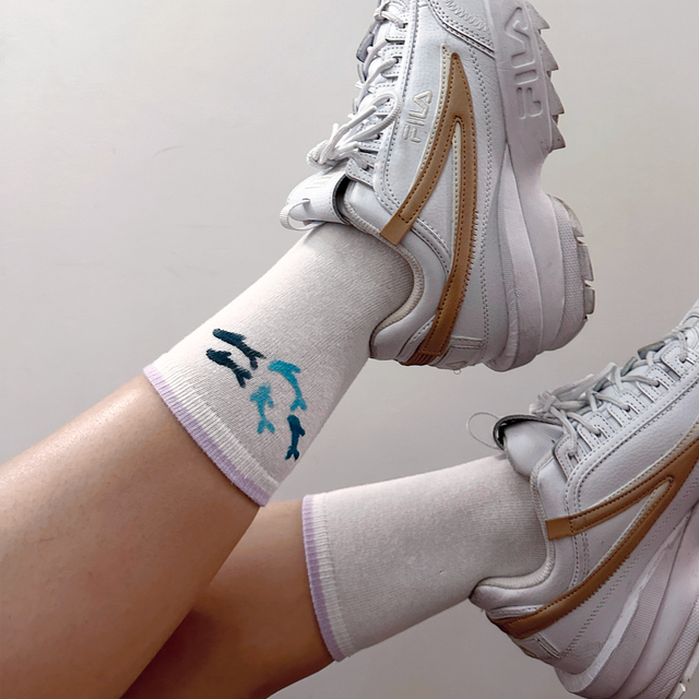 Chaussettes poissons bord bleu pastel