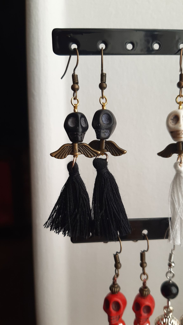 Boucle d&#039;oreilles Santa Muerte ailées
