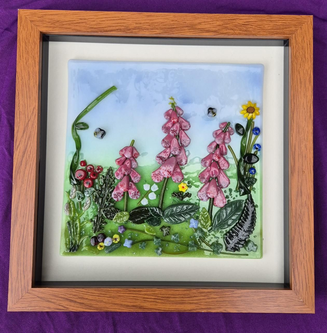 Fused glass framed image of pink foxgloves