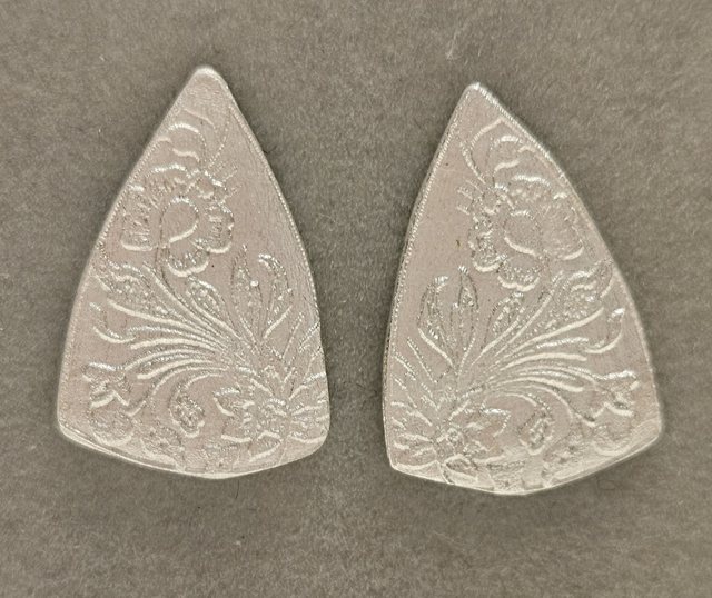 Imprinted flower silver stud earrings