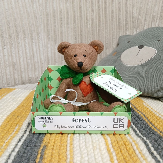 Forest. Small size, handmade teddy bear. UKCA. Tray base packaging. Standard Wool Felt. Brown. Green.