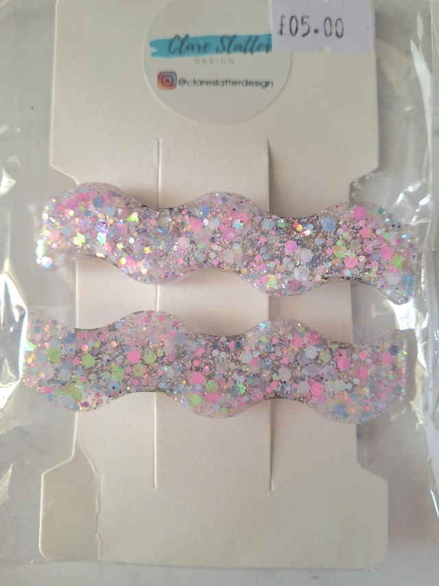Pink, blue and green wiggle clip pair