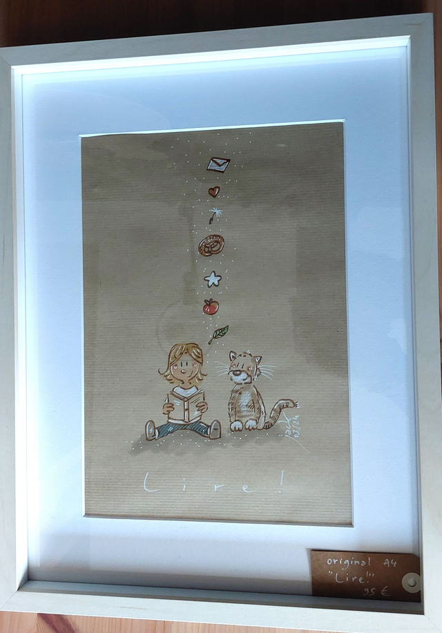 VENDU "Lire" - Dessin format A4 sur papier - cadre 32x42 - frais de port compris pour la France 120,00 €