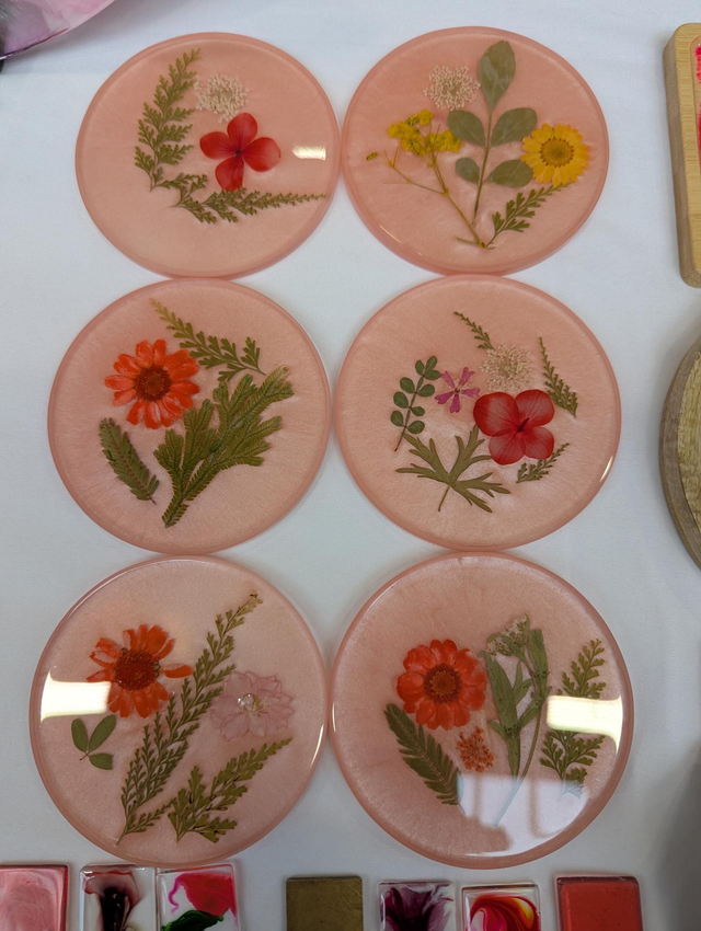 Flower coasters with pink background 