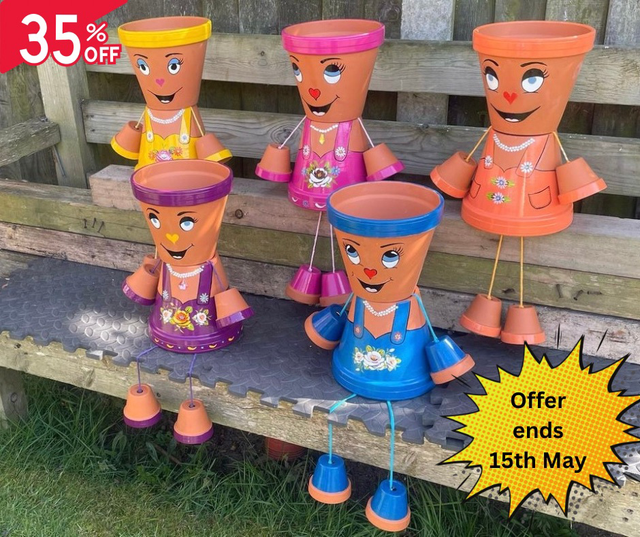 A Garden Sculpture ~ The Pot People