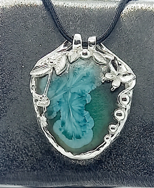 Silver and ceramic pendant